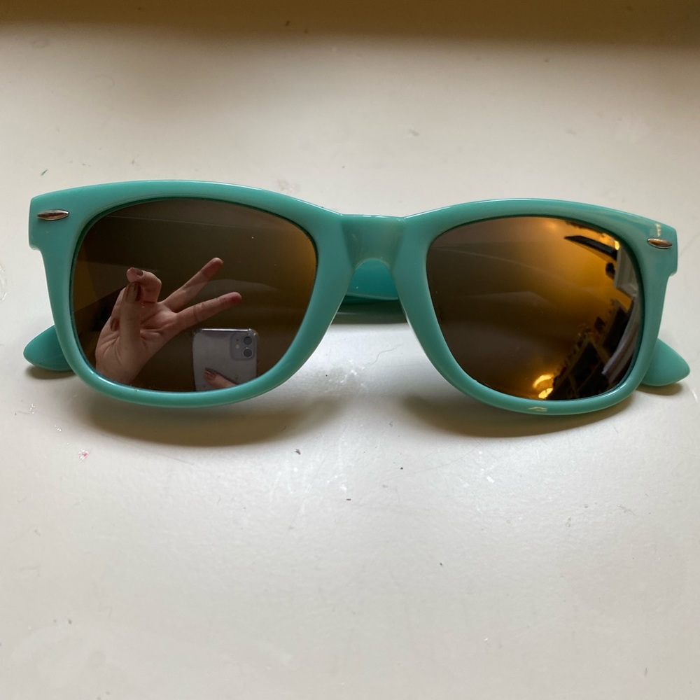 Teal wayfarer style sunglasses
